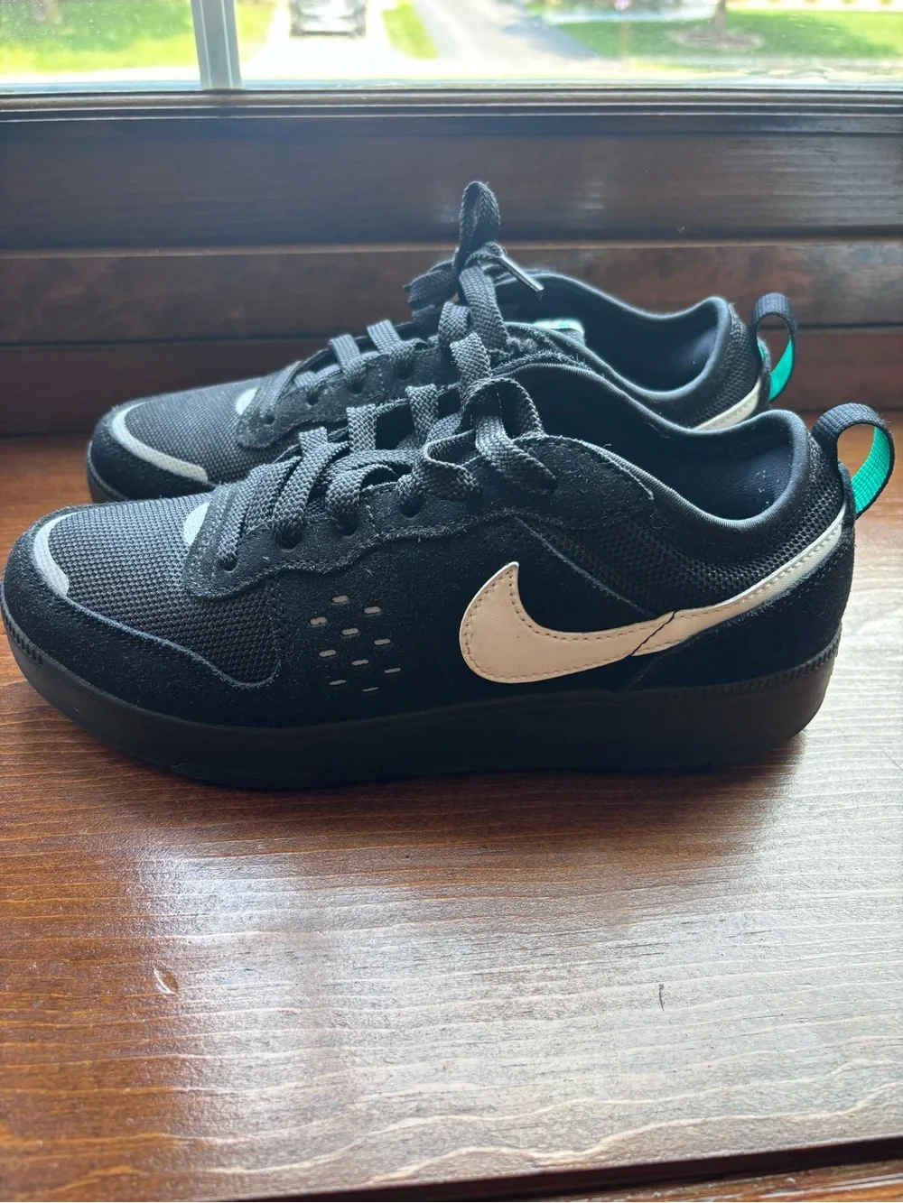 Nike Black Sneakers with Teal Accents